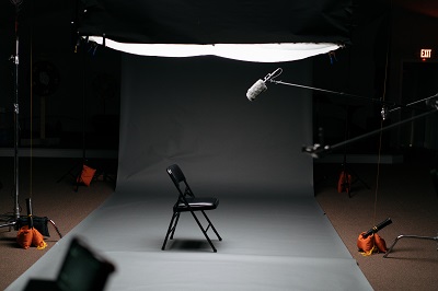 A video production studio, darkly lit